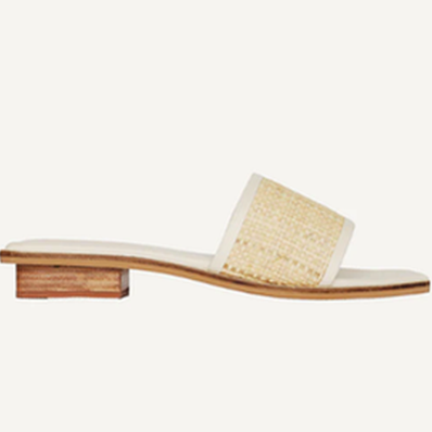 Expertly crafted for a sophisticated summer look, these handwoven leather sandals feature a stylish raffia strap and a comfortable padded insole. Perfect for all-day wear, the petite stacked heel adds a touch of height to your casual summer uniform. Leave your "nice" shoes on for long outings without sacrificing comfort. Color | Cream Raffia Handwoven Rattan Heel Height: 2 cm Handmade in India