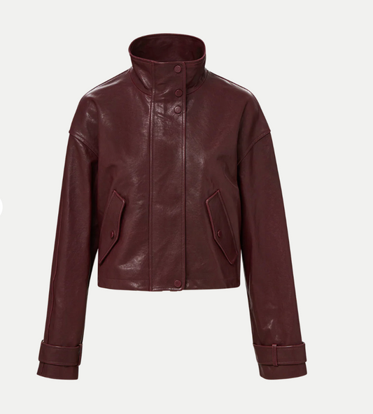 Brown leather jacket on a light gray background