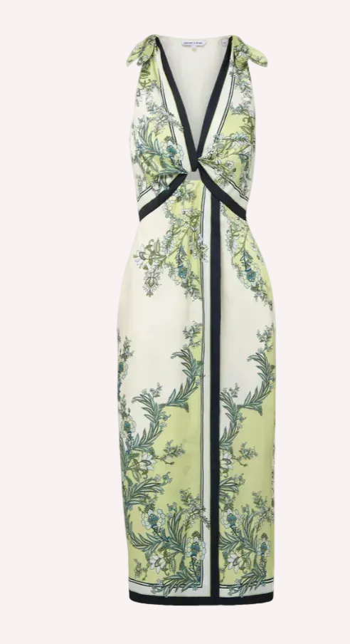 Floral patterned dress with black accents on a white background