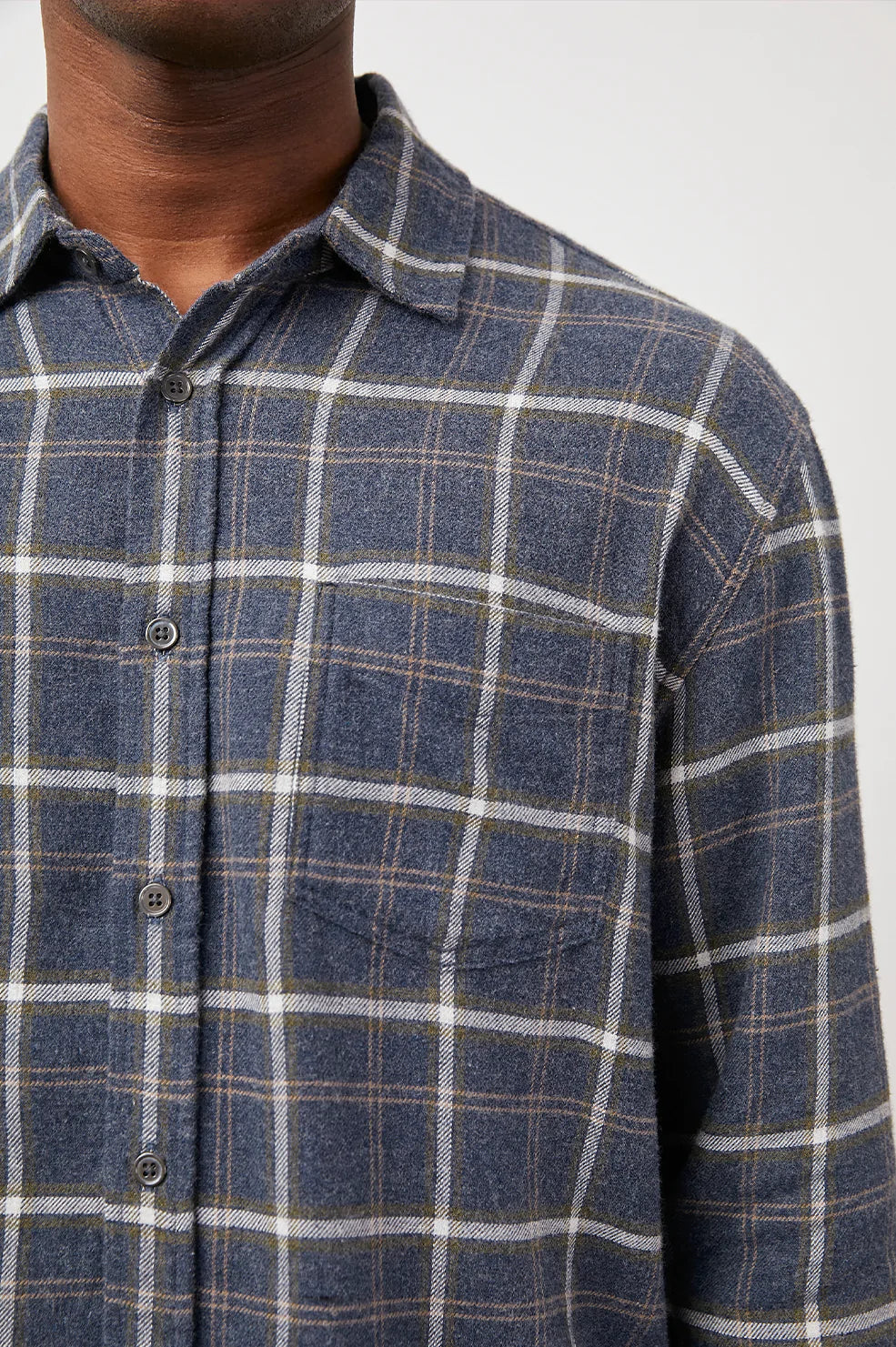 The Lennox shirt is made from a soft and comfortable fabric. This plaid shirt is a traditional fit flannel with a single pocket.  55% Cotton 25% Rayon  Fits true to size