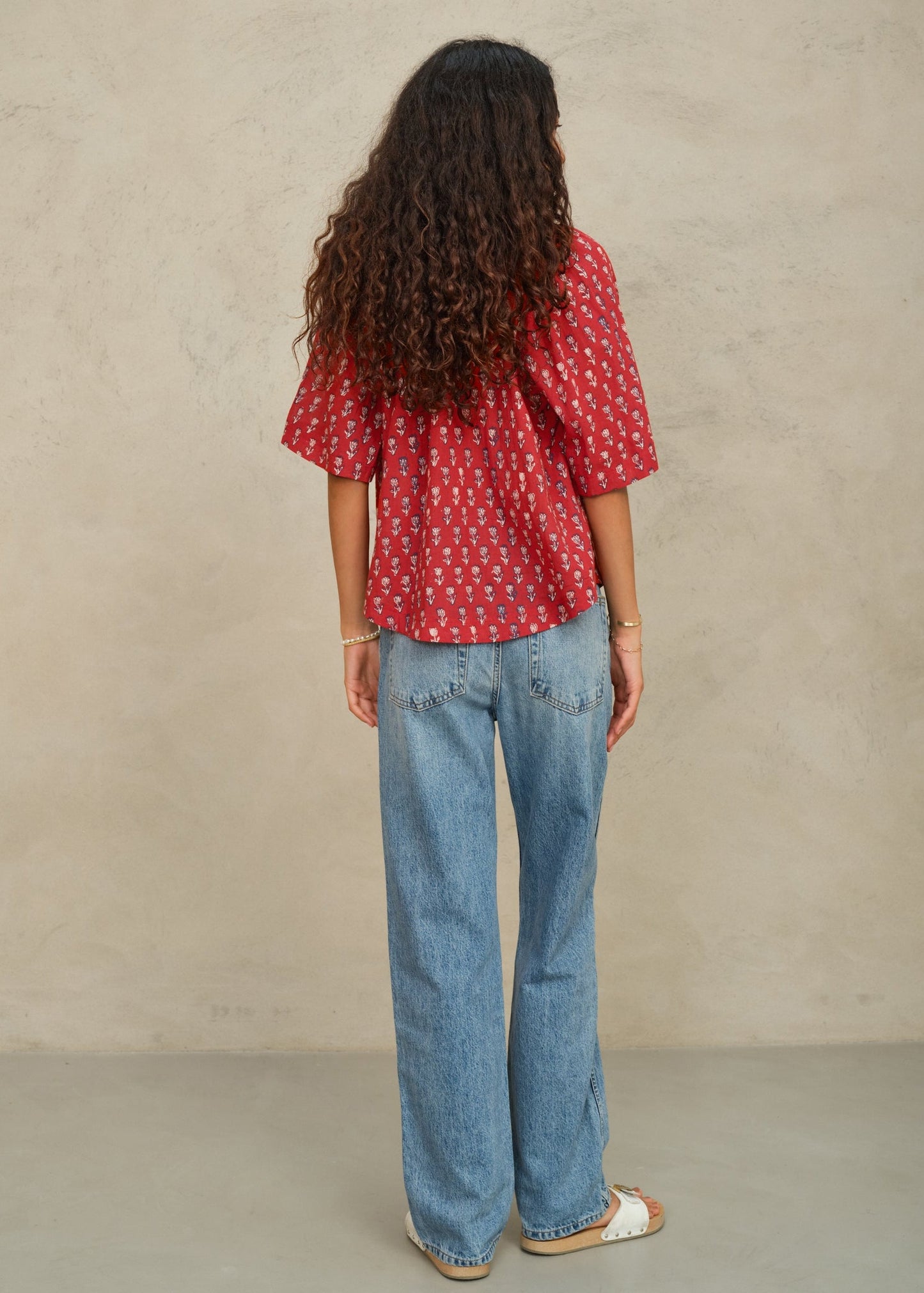 MABE Ari Print Gathered Top Red - lifestyle available at Hiptique boutique in Woodland Hills California