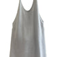 Blue Cashmere tank top on a hanger against a neutral background