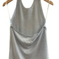Blue Cashmere tank top on a hanger against a neutral background