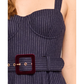 Navy pinstripe dress with a belt and gold buckle on a person.