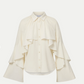 White blouse with ruffled sleeves on a white background