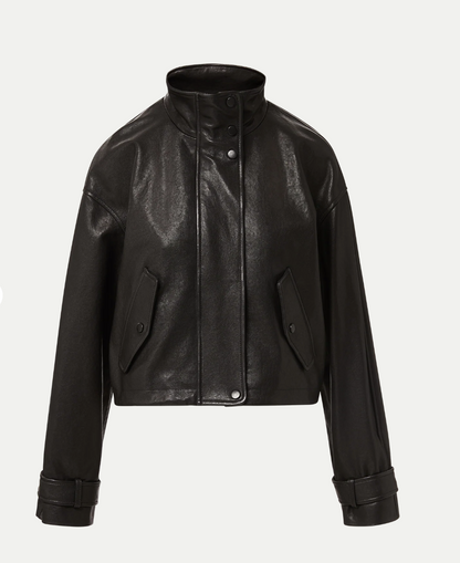 Black leather jacket on a light gray background