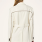 White coat with black accents worn by a person on a white background