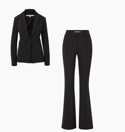 Black blazer and black pants on a white background