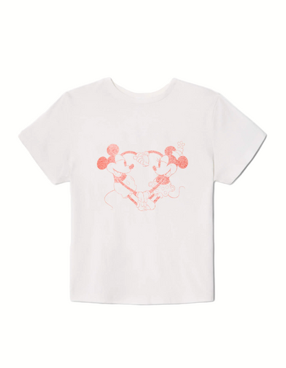 White t-shirt with a pink cartoon character design on a white background