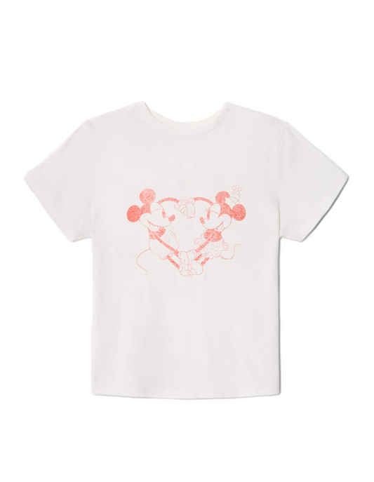 White t-shirt with a pink cartoon character design on a white background