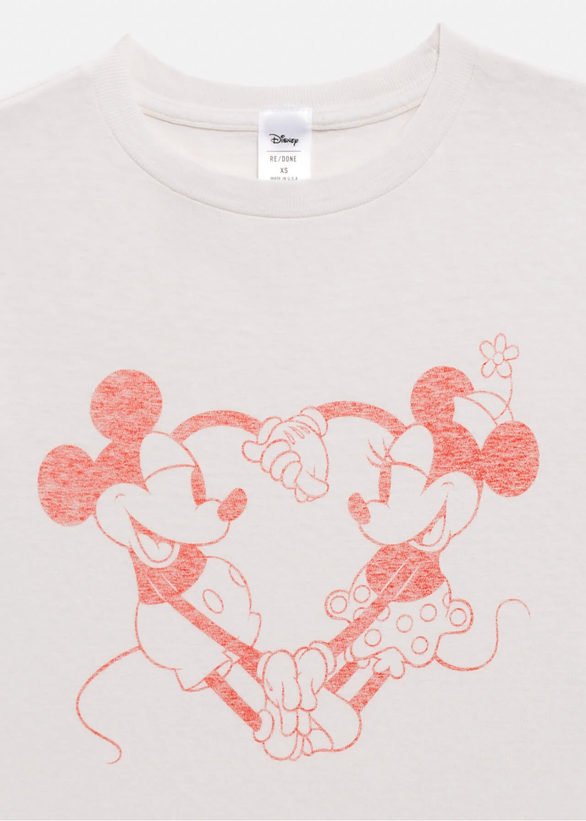 White t-shirt with red cartoon characters holding hands on a white background