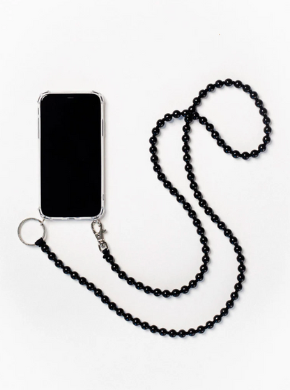 ina.seifart Beaded Phone Necklace - detail view of wooden beads and phone pocket