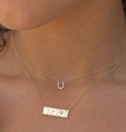 Zofia Day 14K Diamond Horseshoe Necklace - detail view of horseshoe pendant with diamond accents on chain