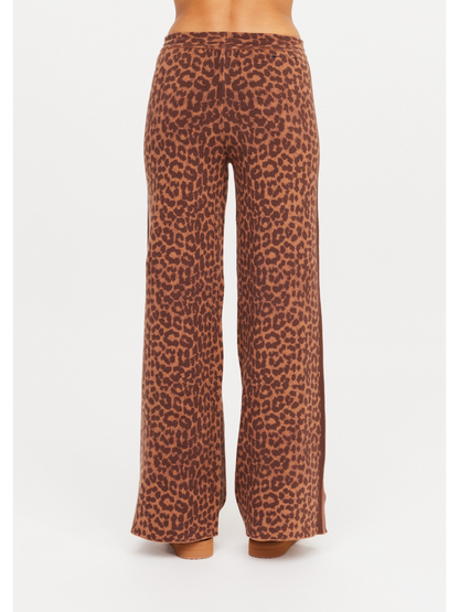 Leopard print pants on a white background