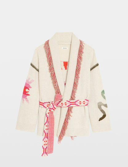 Beige robe with colorful patterns and a belt on a light gray background