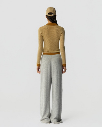 Guest In Residence Pique Shrunken Polo - textured cotton polo shirt on model