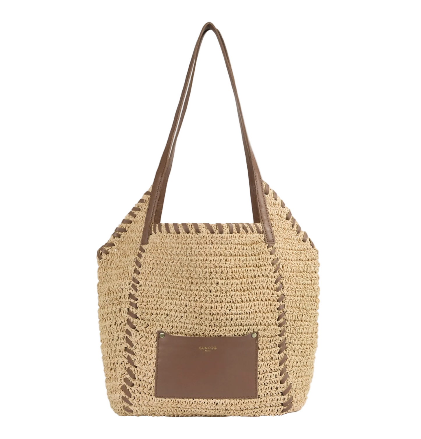 Woven straw handbag with brown leather accents on a light gray background