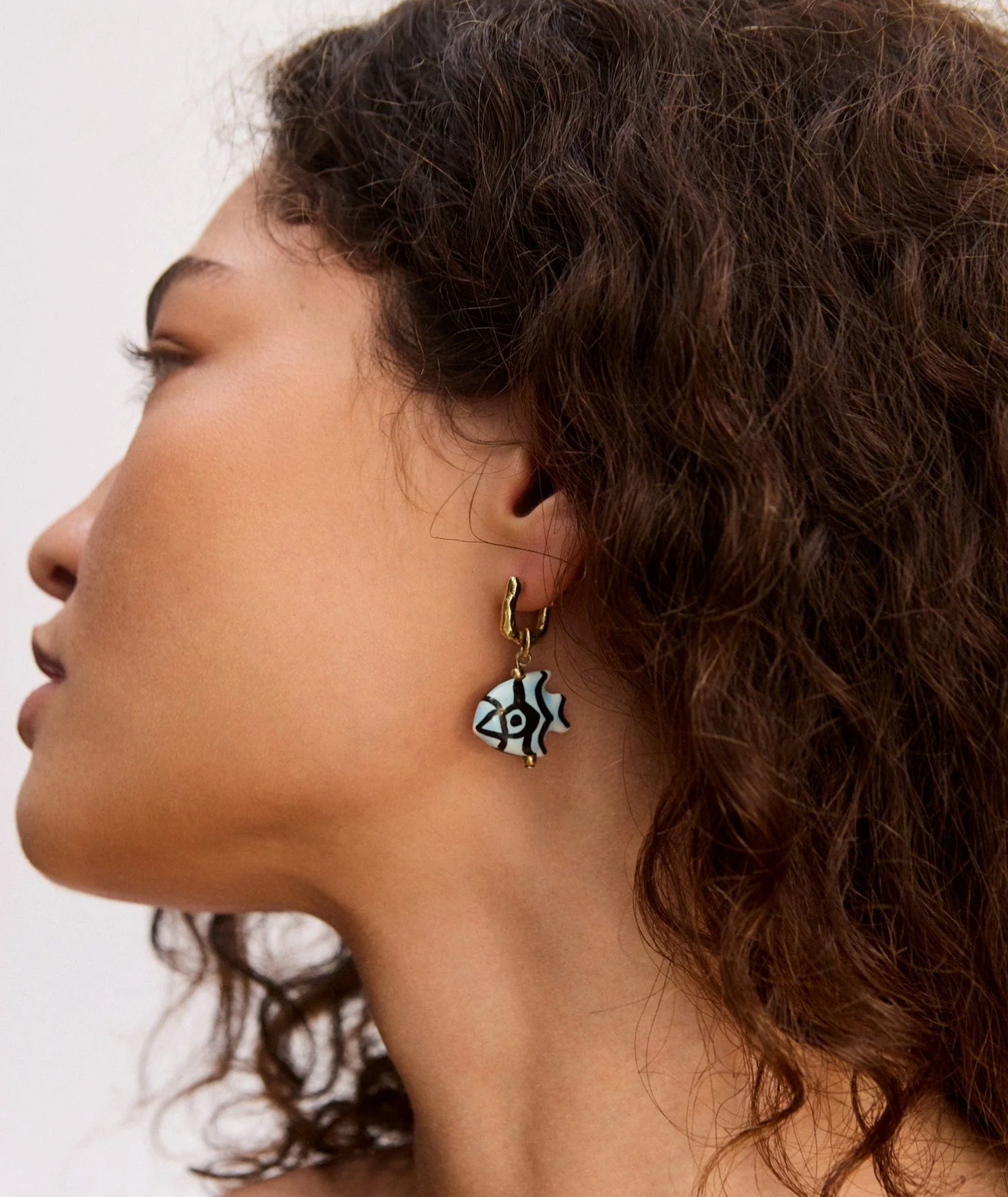 Hiptique Calypso Ceramic Fish Earring - hand-painted ceramic fish dangle earring detail view