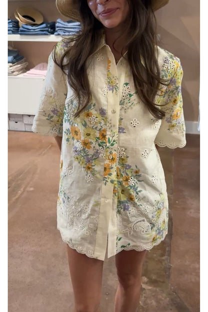 Woman wearing a floral dress with a blurred background