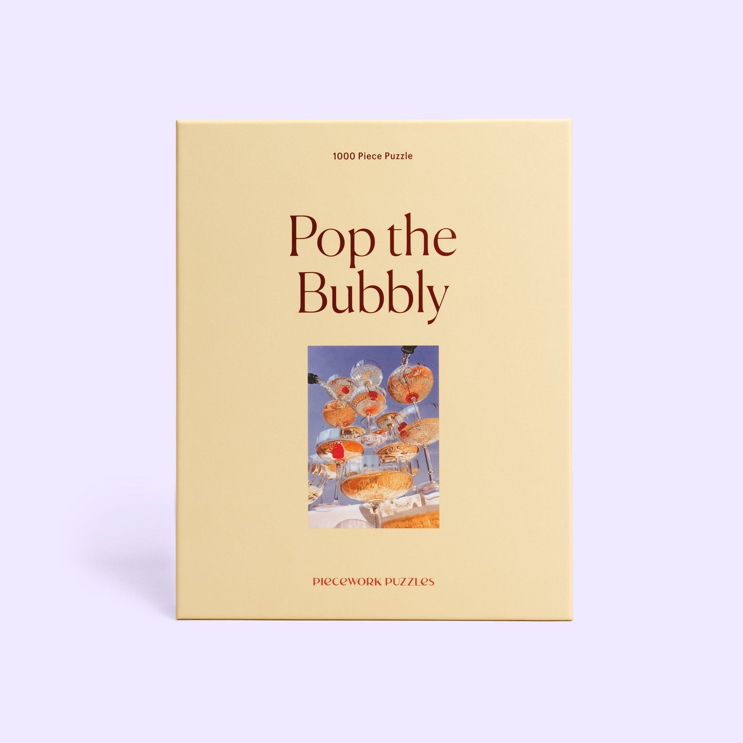 Piece Work Puzzles Pop the Bubbly puzzle box - available at Hiptique Woodland Hills California