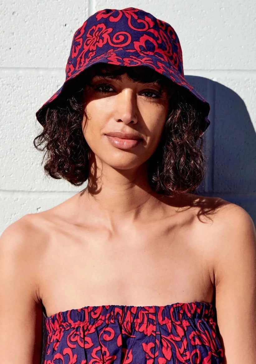 A bucket hat featuring a floral print.  100% cotton.
