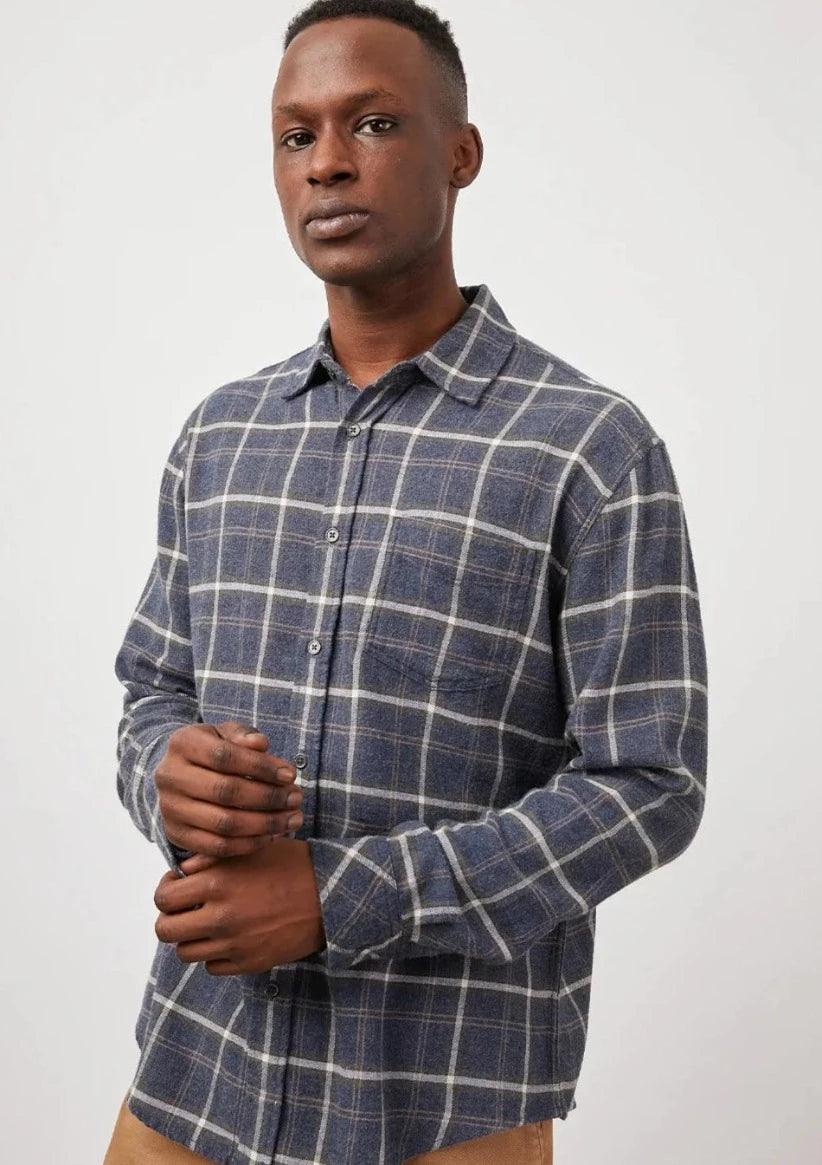 The Lennox shirt is made from a soft and comfortable fabric. This plaid shirt is a traditional fit flannel with a single pocket.  55% Cotton 25% Rayon  Fits true to size