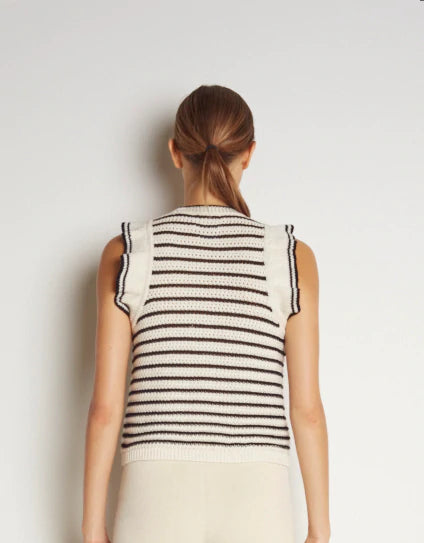 Viola is a feminine sweater tank with tipped ruffled armhole detail and a classic stripe combined with a modern textured stitch in pima cotton. Hand made in Peru.
